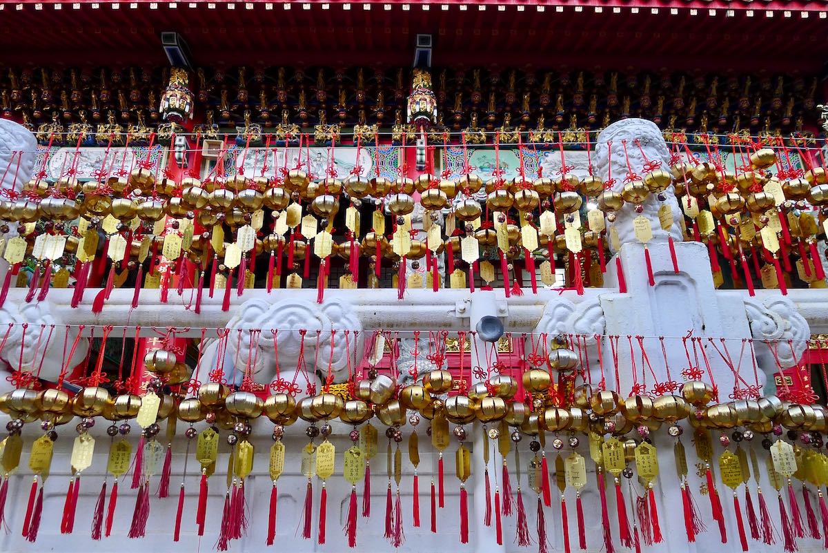 Gold wishing bells at Wenwu Temple on Sun Moon Lake, a popular stop on a 3-week Taiwan itinerary.