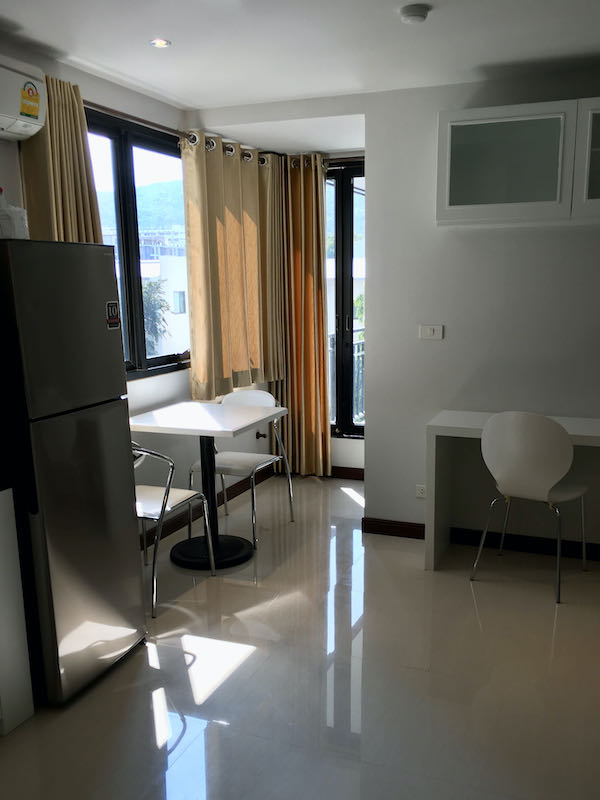 Spacious living room in Nimmanhaemin apartment.