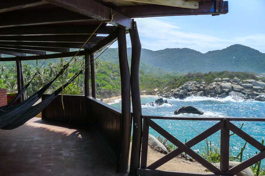 Hammocks in a covered beach hut overlooking Cabo San Juan in Tayrona National Park