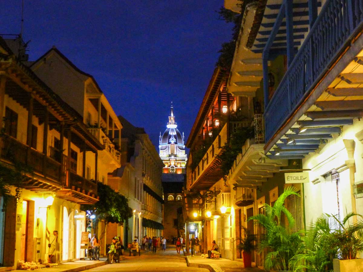 Typical Cartagena balconies hang over the street in front of the cathedral at night.