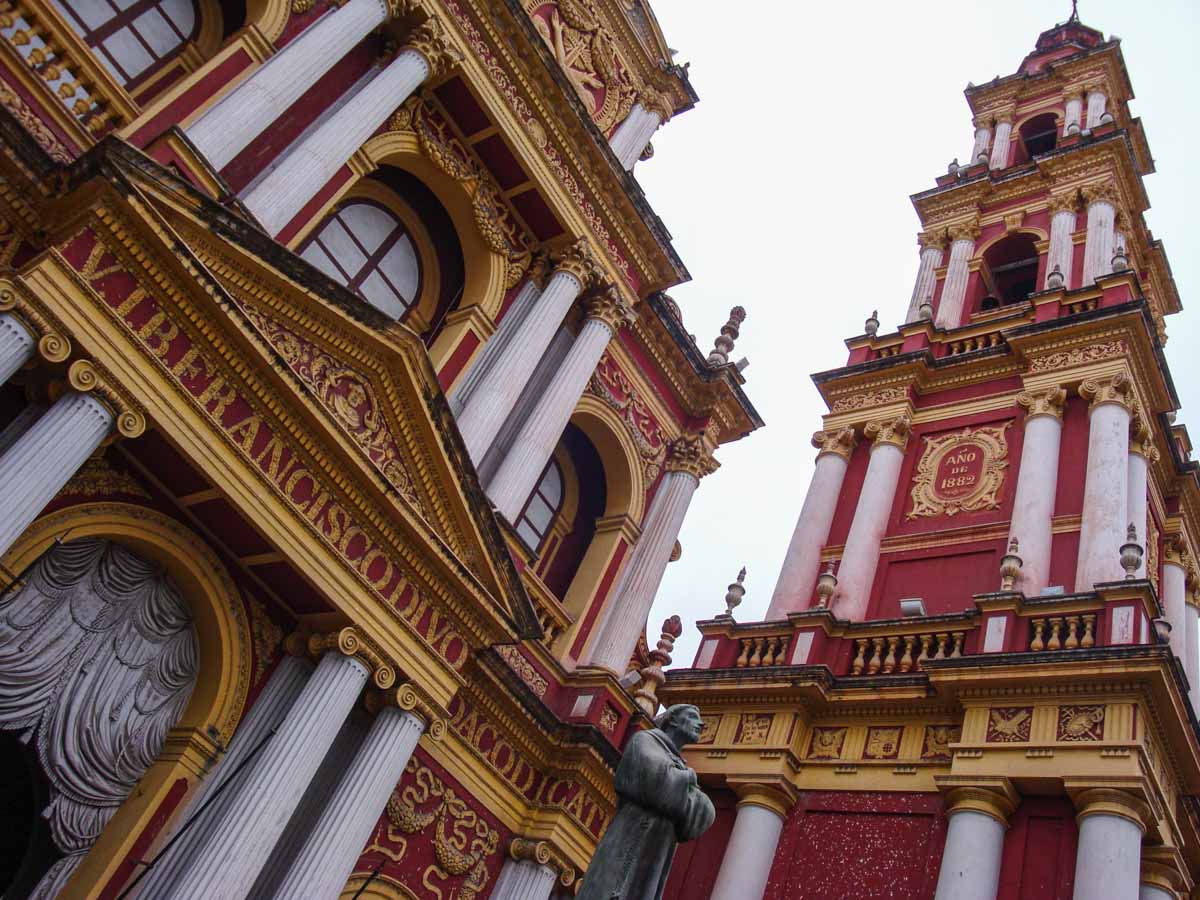 The pink and yellow façade of Basílica Menor y Convento San Francisco church in Salta, Argentina.