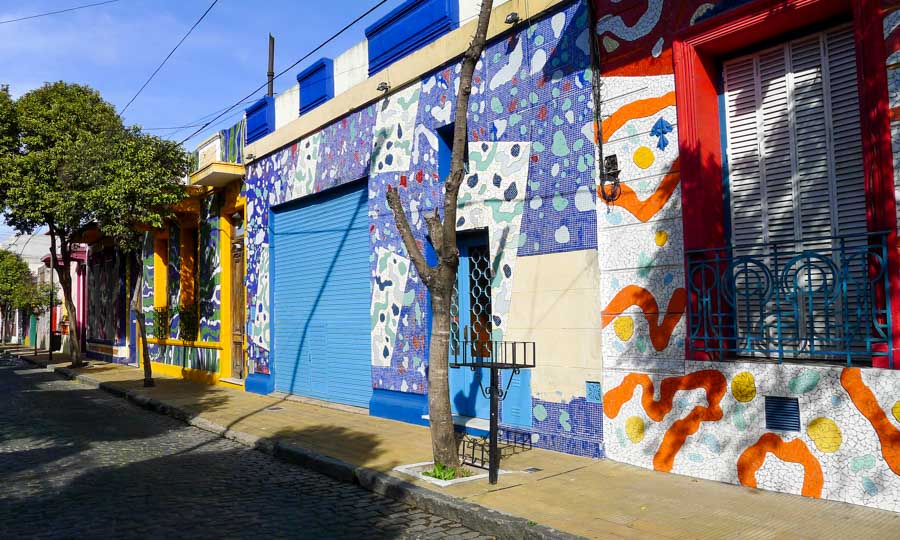 Colorful mosaic tiles decorate the houses of Calle Lanin in Barracas. 