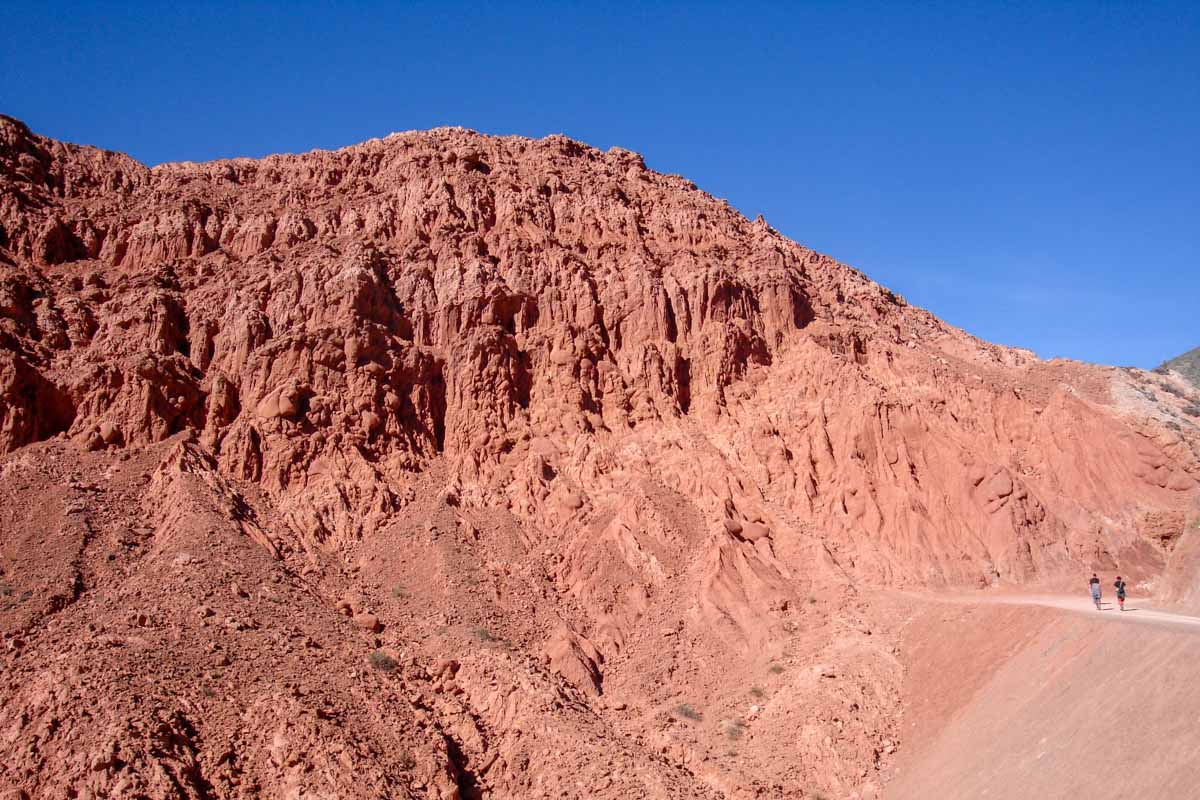 Hiking near the Cerro de los Siete Colores in the Quebrada de Humahuaca, which you can visit on a day trip from Salta or Jujuy.