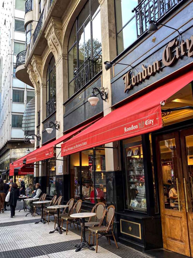 Sidewalk tables facing the street (Paris-style) at London City cafe on Avenida de Mayo.