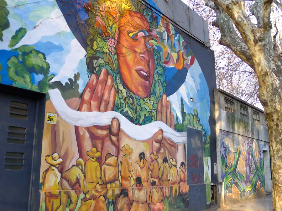 Madre Tierra mural by well-known Argentine street artist Ever Siempre in Villa Crespo.