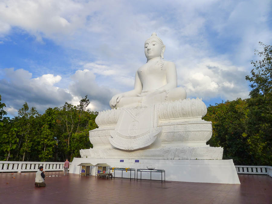 Big Buddha statue overlooking the tiny town of Pai, Thailand.