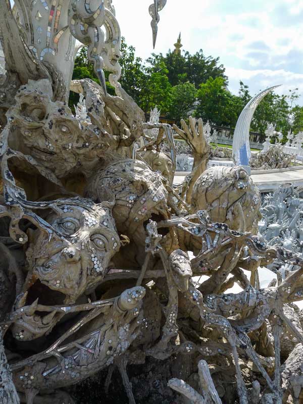 Demon sculptures at the White Temple in Chiang Rai.