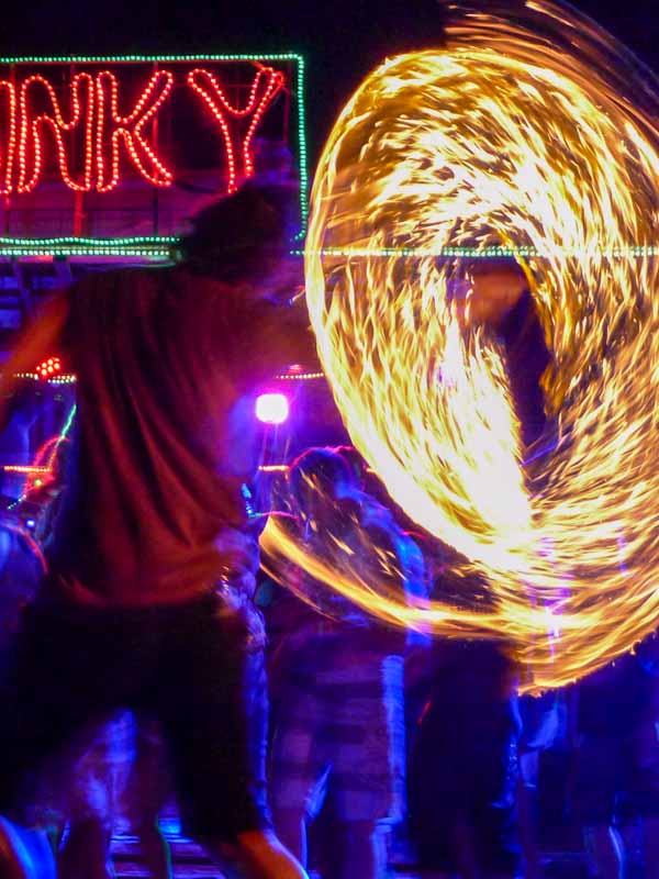 Fire show at Slinky Bar on the infamous party island of Koh Phi Phi Don, a popular stop on backpacker itineraries for Thailand.