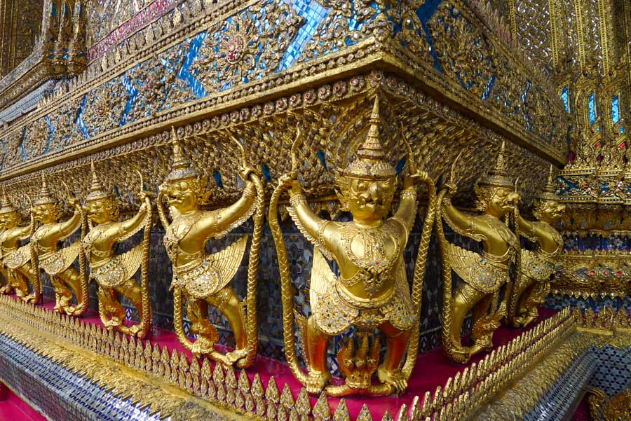 Intricate gold carvings and colorful tiles at Wat Phra Kaew in Bangkok, the first stop on this three-week itinerary for Thailand.