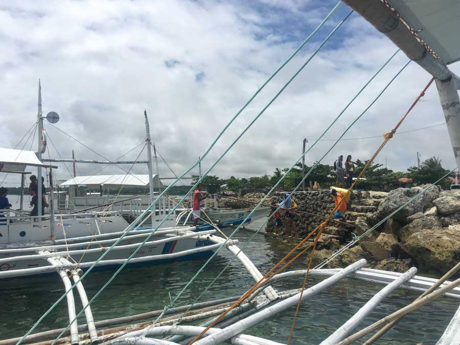 Outrigger boats getting ready to head to Malapascua Island from Maya Port in Cebu.