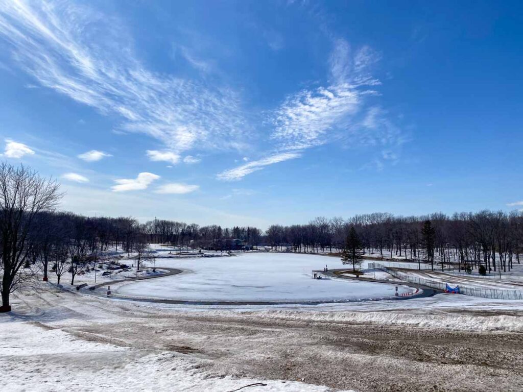 Mont Royal's Beaver Lake (Lac aux Castors) still covered in snow and ice in early April.