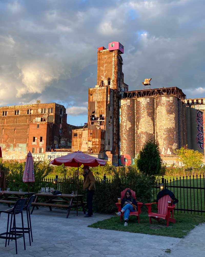 Montreal's Pink House (Maison Rose) perched on top of the abandoned Canada Malting factory. (View from Terrasse Saint-Ambroise beer hall next door.)
