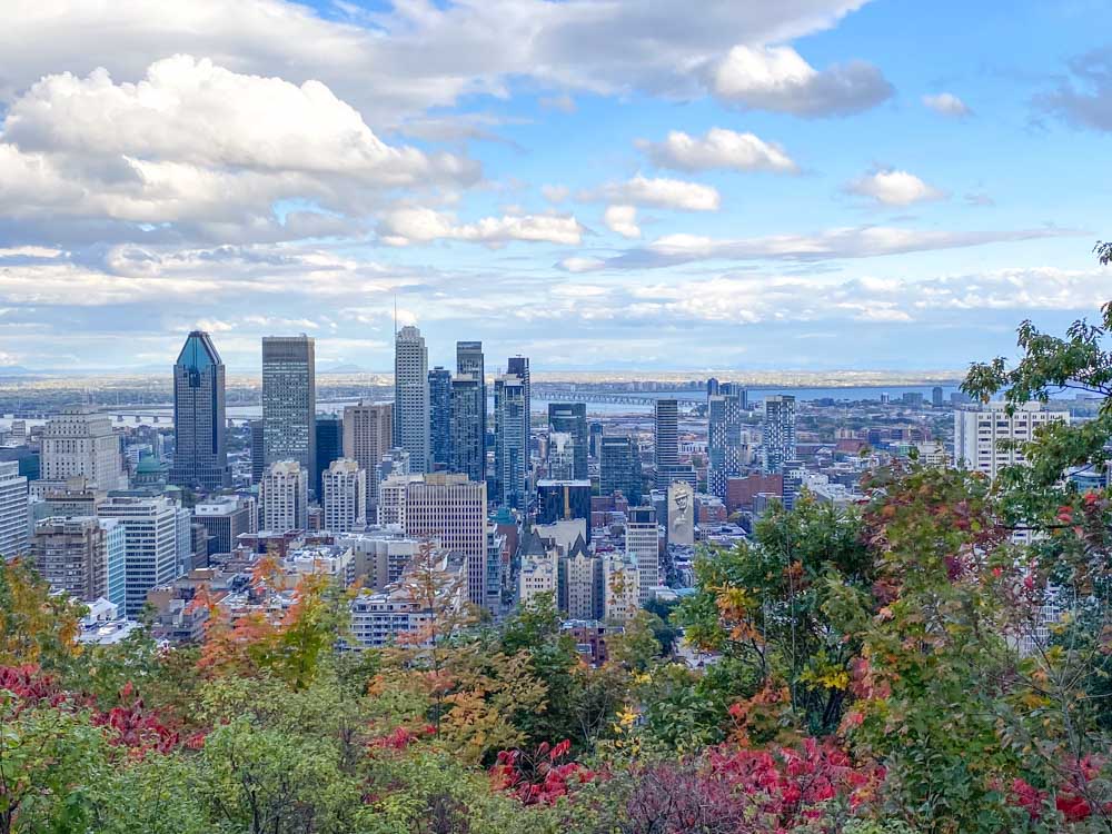 Montreal skyline viewed from Kondiaronk Belvedere on Mount Royal - the first stop on this 2-day Montreal itinerary.