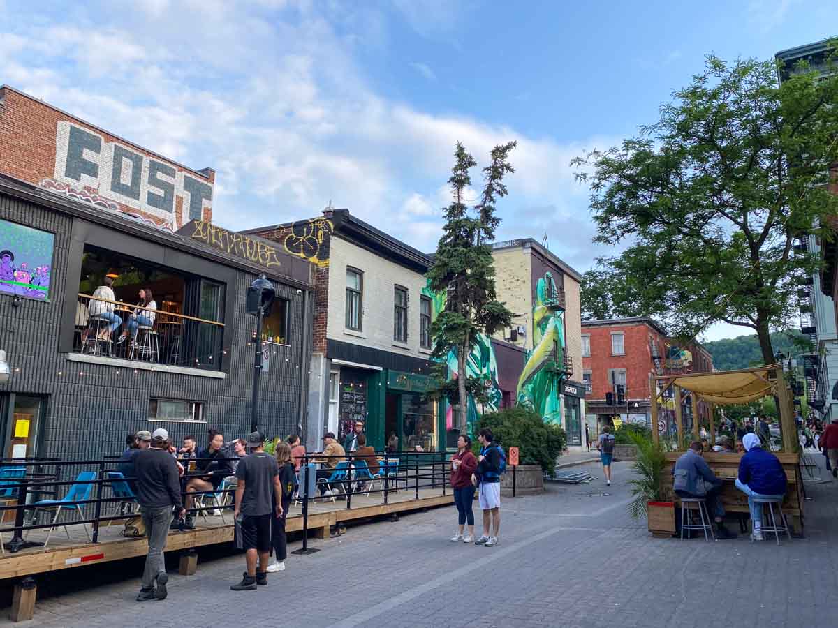 Outdoor terraces and street art on Avenue Duluth in the Plateau.