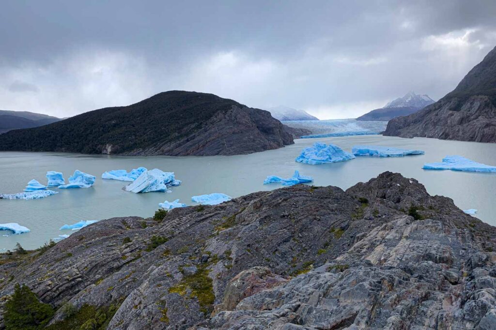 Huge blue icebergs float in front of Grey Glacier lookout point.
