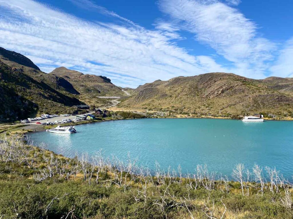 The Pudeto cafe, parking lot, and catamaran pier in Lago Pehoé.