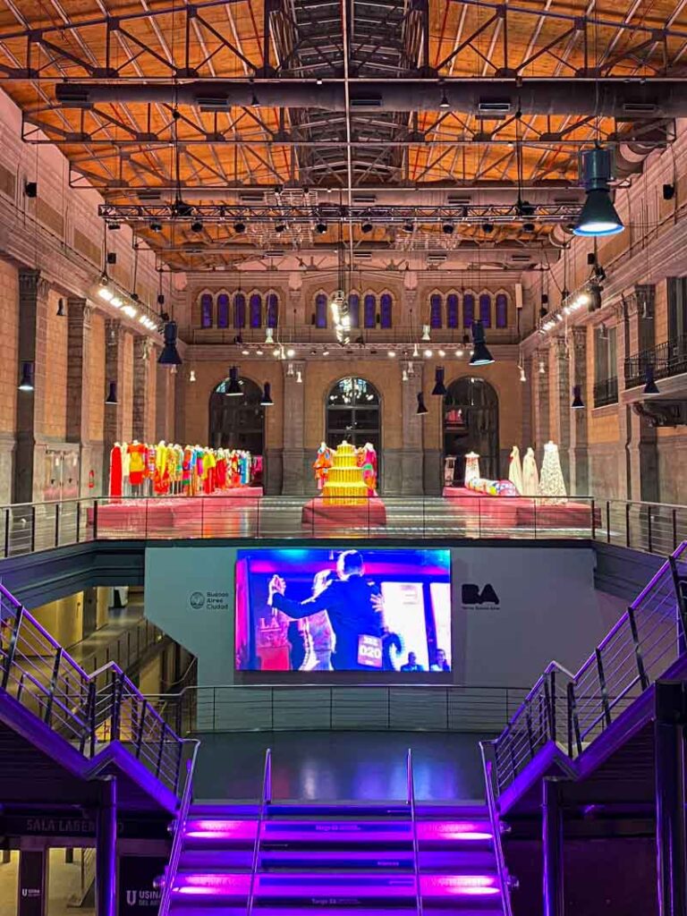 A fashion exhibition on display at the Usina del Arte, seen from across the main staircase of the building - a former power plant turned cultural center.