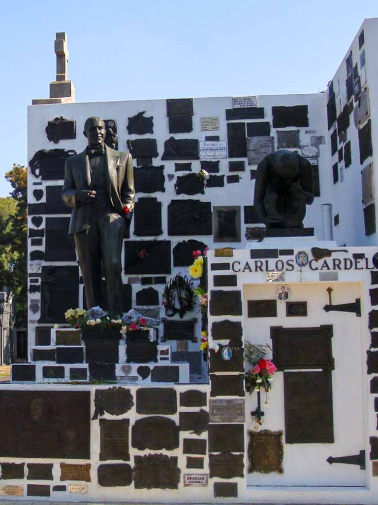 The grave of Argentine tango musician Carlos Gardel in Chacarita Cemetery - a less touristy alternative to the well-known Recoleta Cemetery.