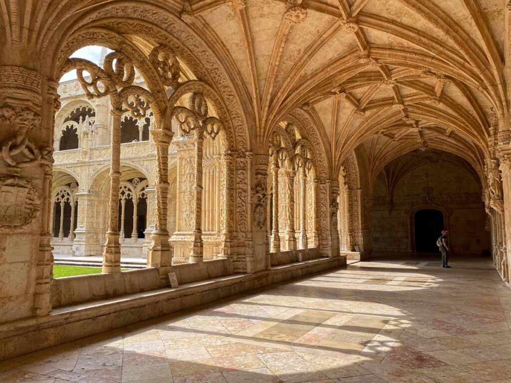 Afternoon sun highlights impressive Manueline architecture at Jeronimos Monastery in Belem.