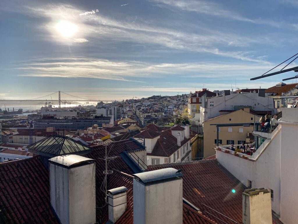 Ponte 25 de Abril and the red roofs of Lapa seen from Jardim do Alto de Santa Catarina (a.k.a. Adamastor viewpoint).